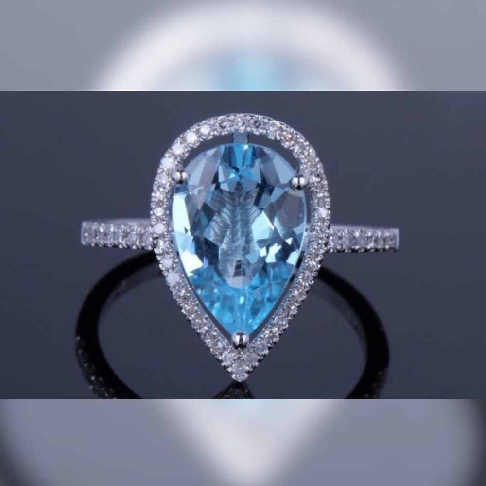 4 CT Pear-Cut Blue Topaz Sterling Silver Ring